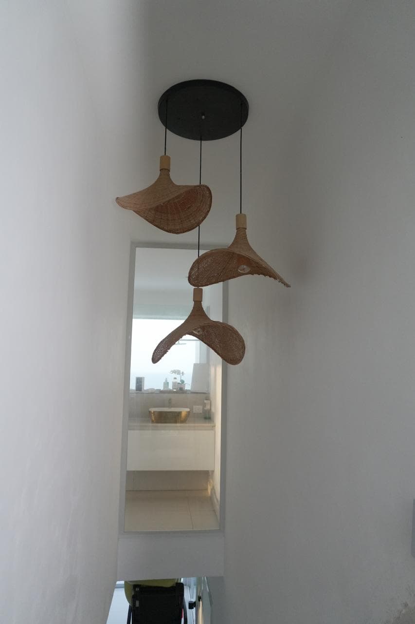 Hallway with rattan lamps