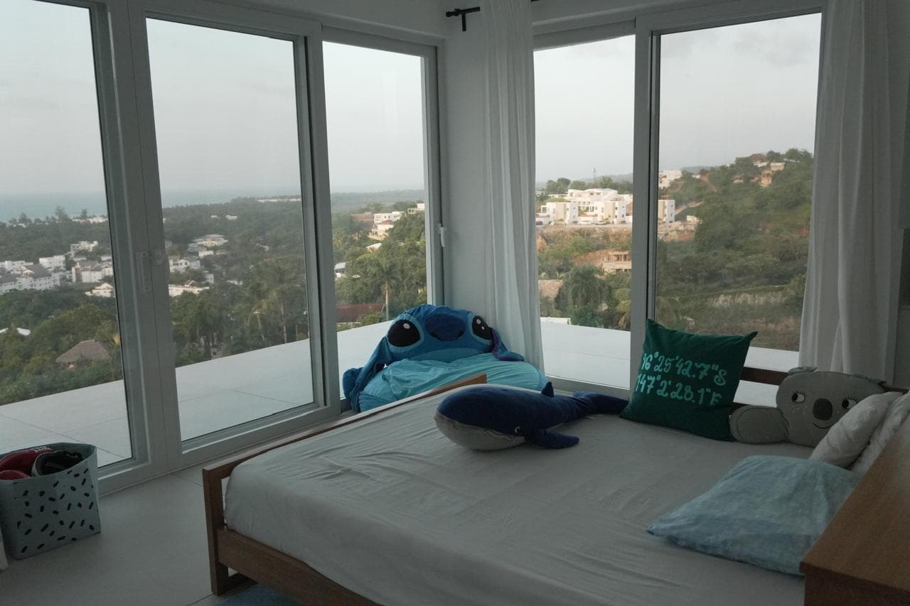 Kids bedroom with corner windows